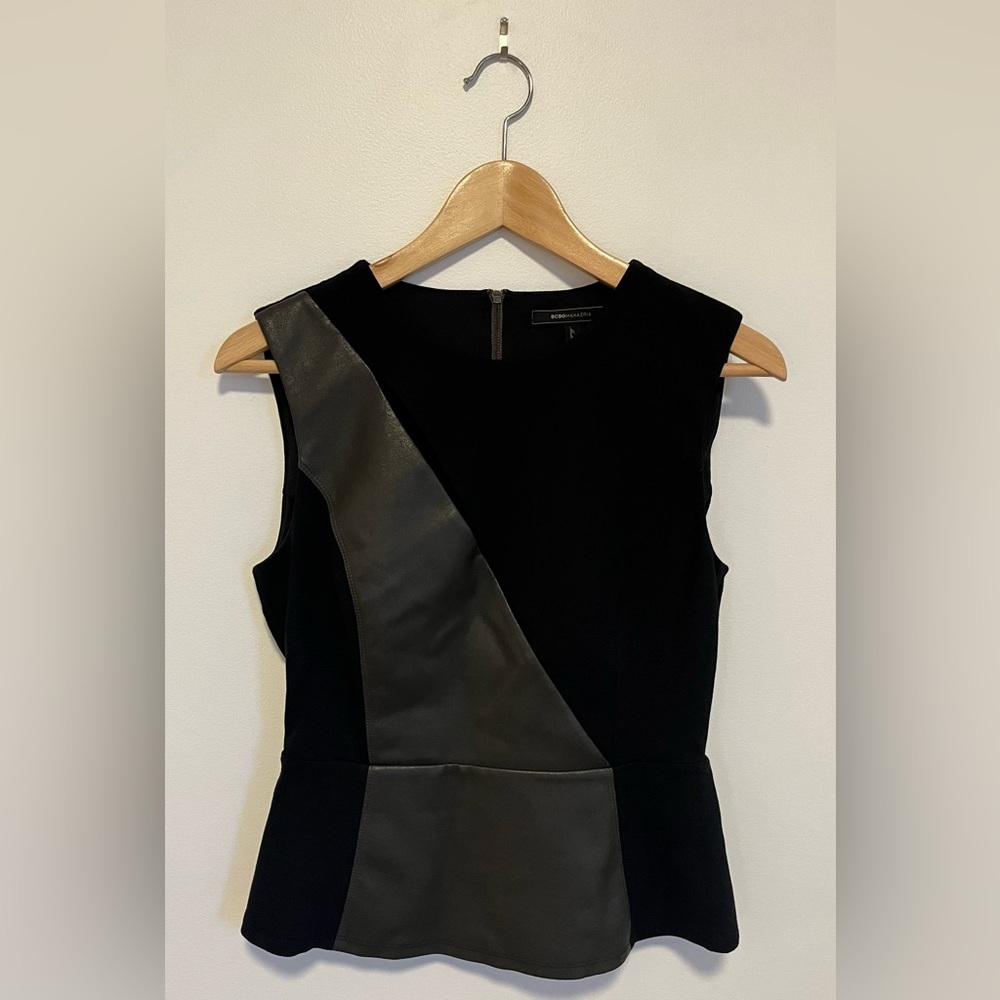 BCBG size 6 sophisticated sleeveless, flare waisted top with faux leather